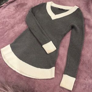 Warm sweater. Grey and white.